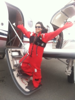 Marlene pops out the PC-12 with the red full survival suit. 