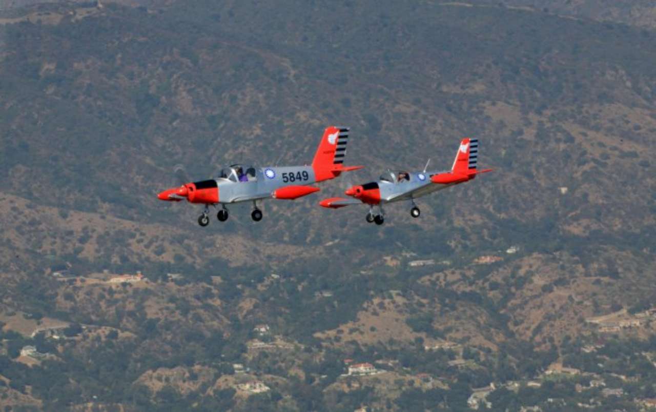 Flying Jeffrey's PL-2 in formation with Leo's PL-1B