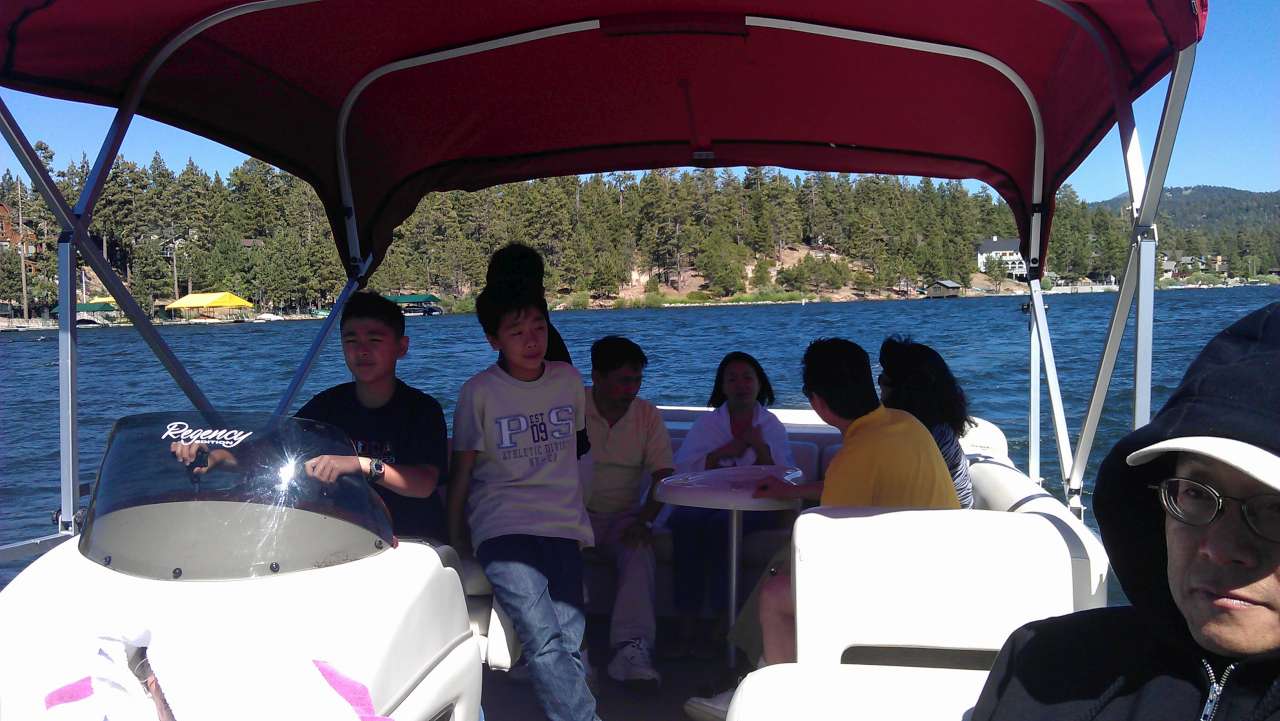 Cameron driving the boat